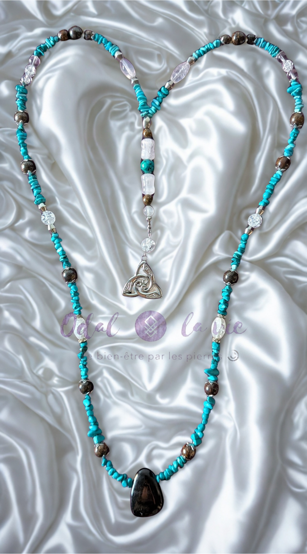 Talisman "Équilibre Infini" : Sautoir turquoise naturelle, hypersthène, bronzite, cristal de roche craquelé et quartz rose, nœud celtique.